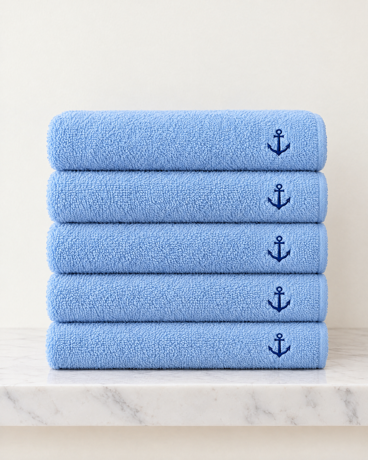 Pack de 5 serviettes 50 × 90 cm – bleu ciel, ancre brodée